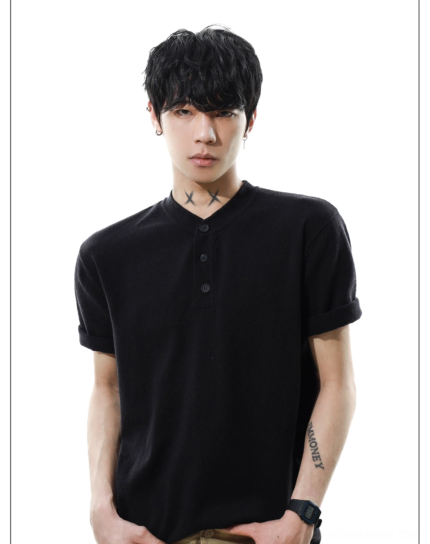 Black men's knit Henley T-shirt front view showing rolled short sleeve cuffs, button neckline, and relaxed fit