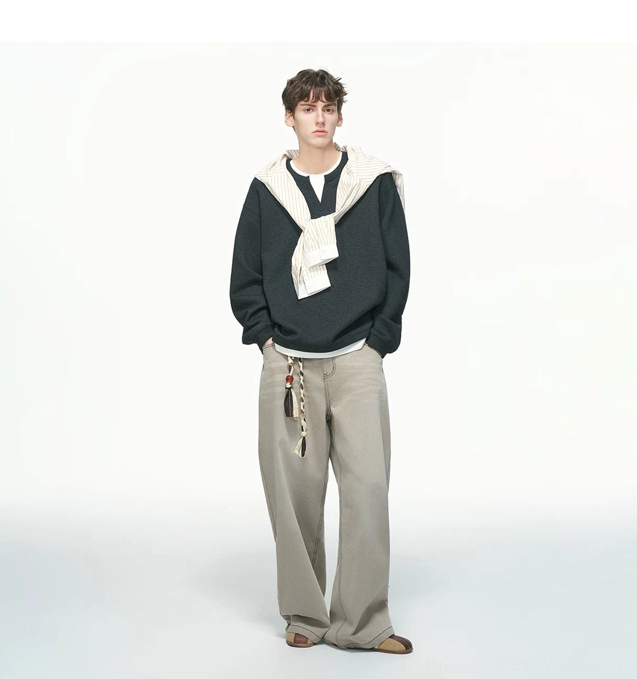Men's relaxed layered sweatshirt designed for casual Seoul streetwear outfits with dropped shoulders and roomy sleeves