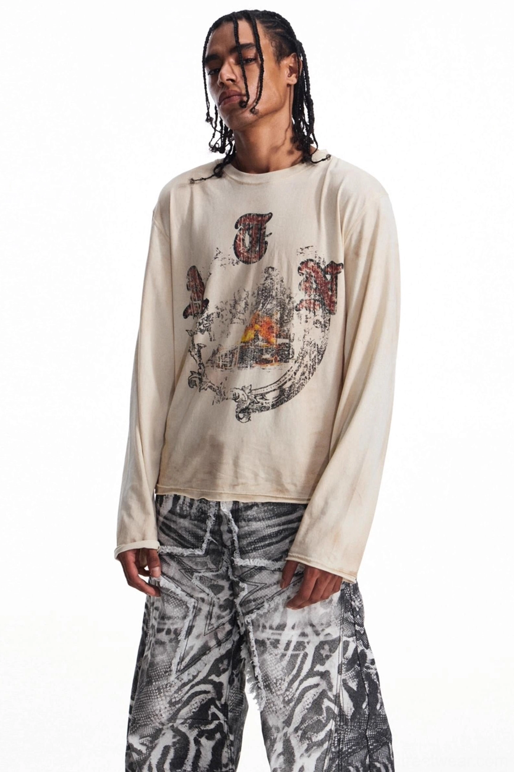 Side front view of relaxed men's long sleeve graphic t-shirt with loose silhouette and contemporary streetwear styling