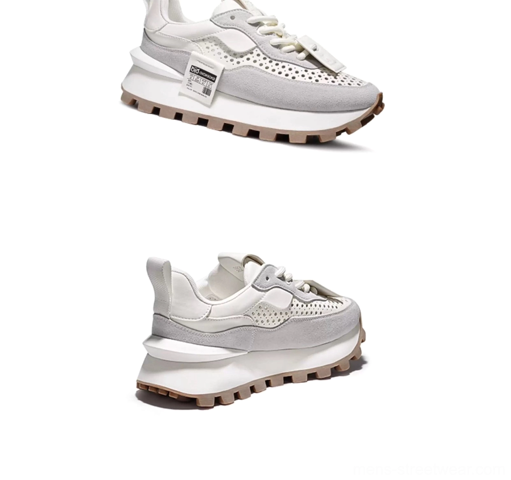Front three-quarter view of men's retro streetwear running sneakers featuring white leather, light grey suede overlays, flat laces, and a thick cushioned midsole