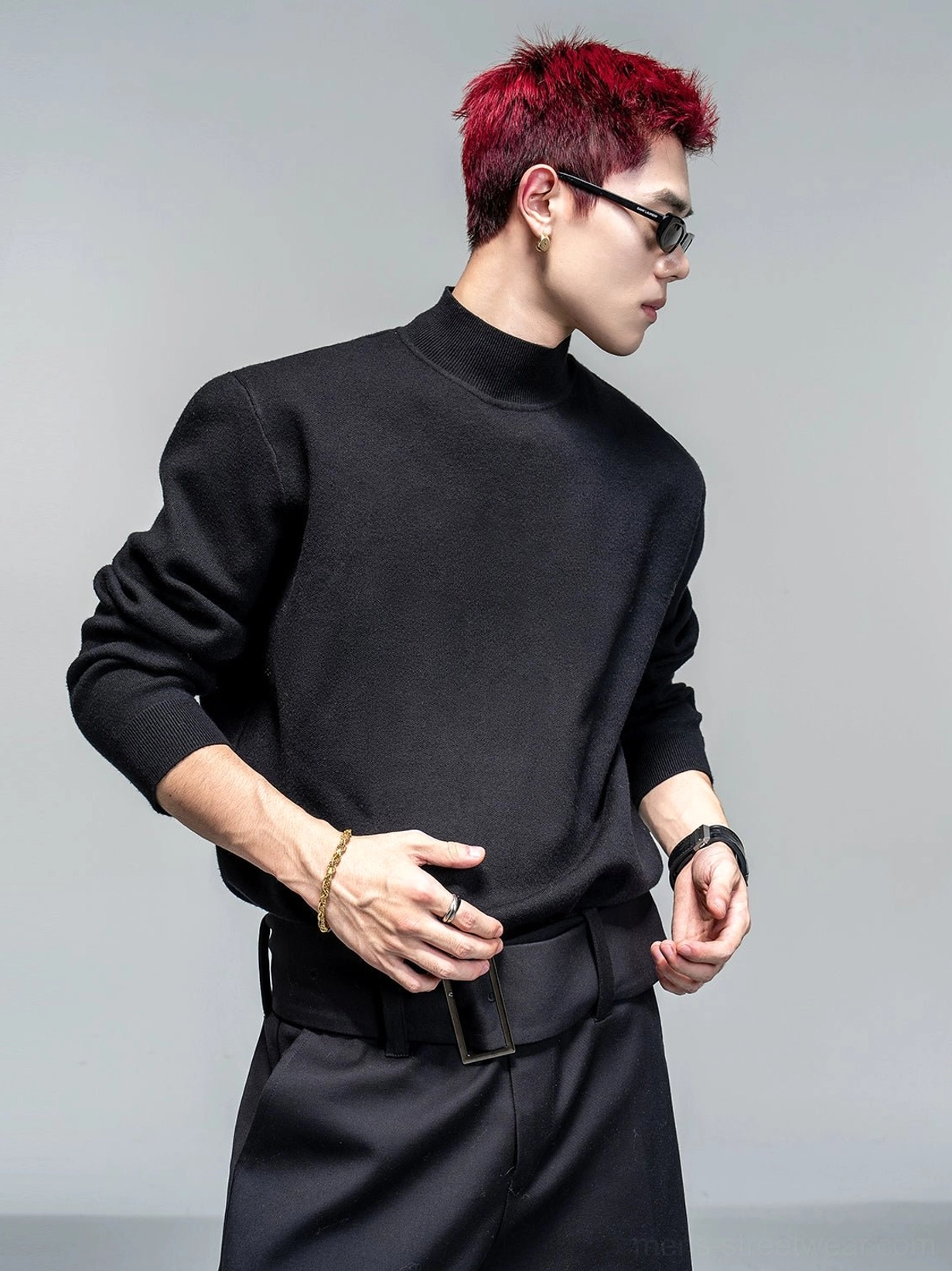 Black men's mock neck knit sweater side view with relaxed fit and modern Korean minimalist streetwear styling