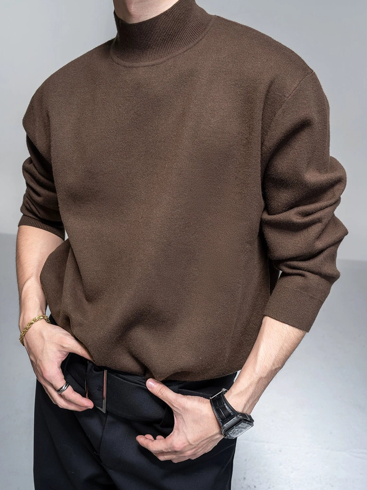 Brown men's mock neck long-sleeve knit sweater with relaxed drop shoulders and clean Korean streetwear design