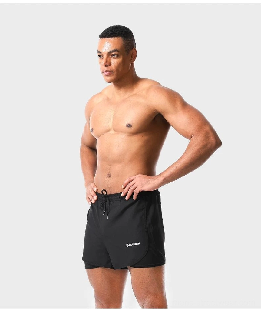 Black men's 2-in-1 quick-dry swim shorts with elastic drawstring waist and mid-thigh athletic fit front view
