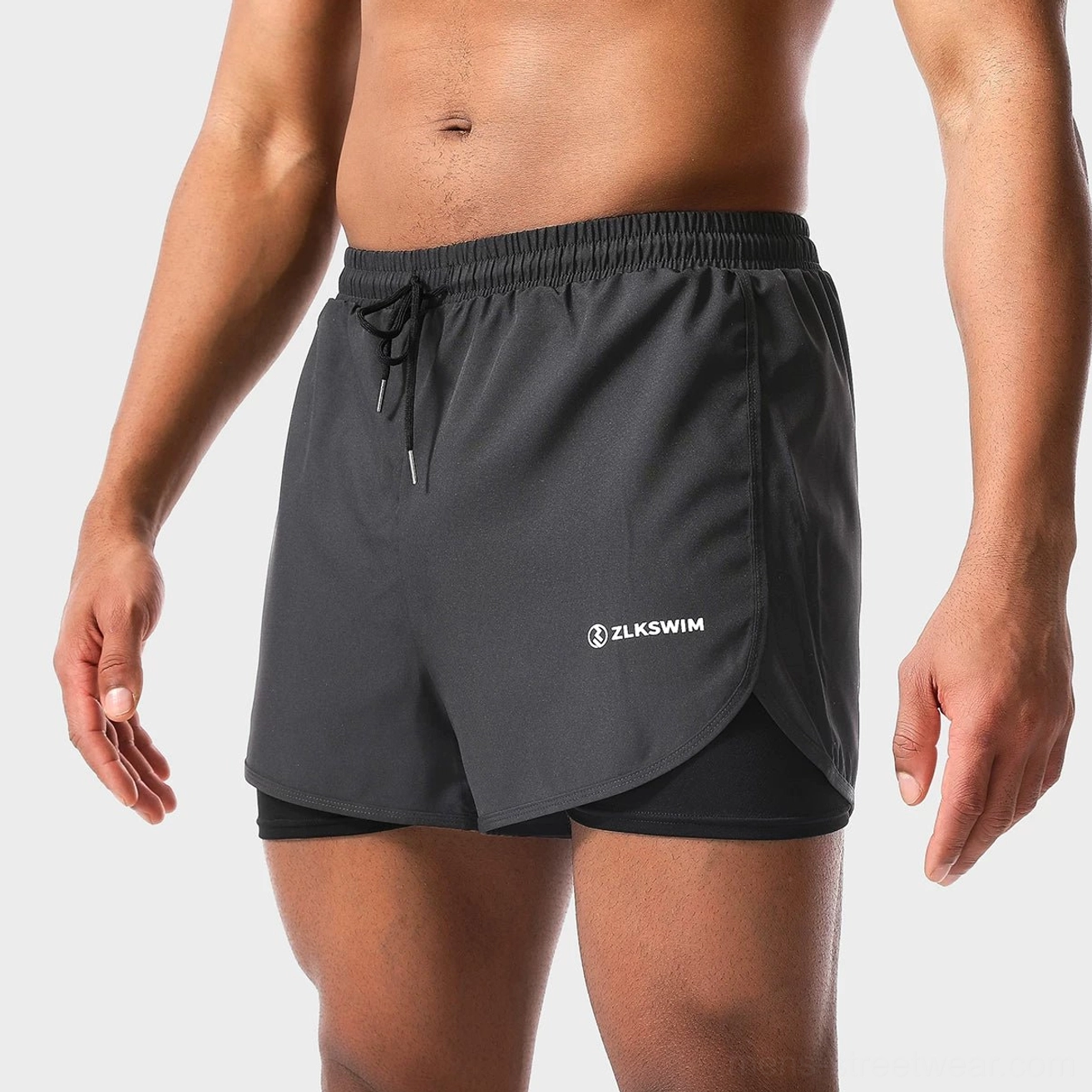 Men's twin-layer quick-dry swim shorts with built-in liner in dark gray athletic beachwear style