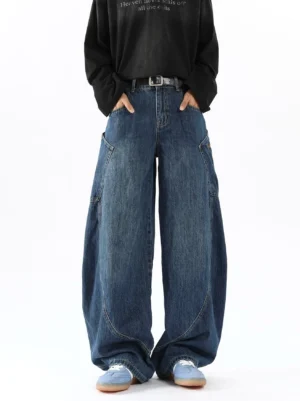 Men's vintage blue balloon cargo jeans front view with relaxed mid-rise waist belt loops wide barrel legs and utility pocket