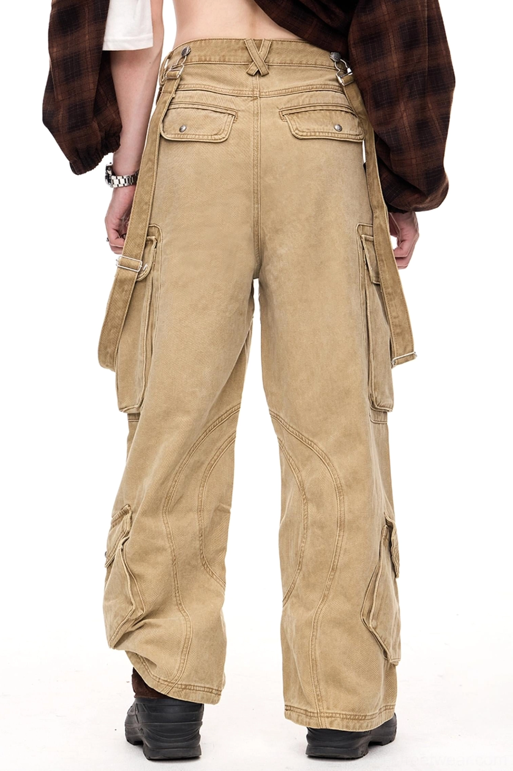 Back view of men's washed khaki wide-leg cargo pants featuring rear patch pockets, curved leg seams, belt loops, and vintage streetwear styling
