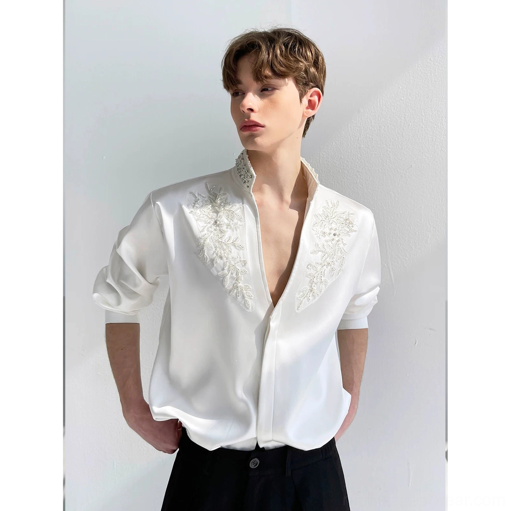 Men's white beaded floral embroidered satin V-neck shirt paired with black trousers for elevated Seoul evening style