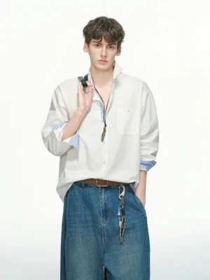 Men's white contrast gingham cuff Oxford shirt with wide-leg denim jeans, relaxed Korean casual streetwear outfit front view