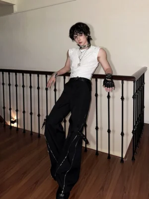 White men's ripple textured studded sleeveless tank top side view styled with black wide-leg streetwear trousers