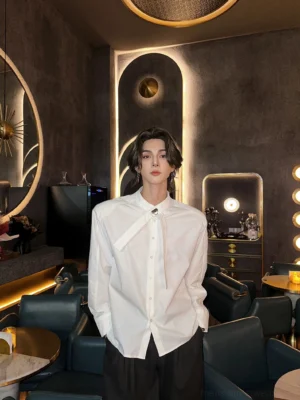 Men's white stand collar buckle tie shirt shown in a full-body front view with relaxed tailored fit in a retro bar setting