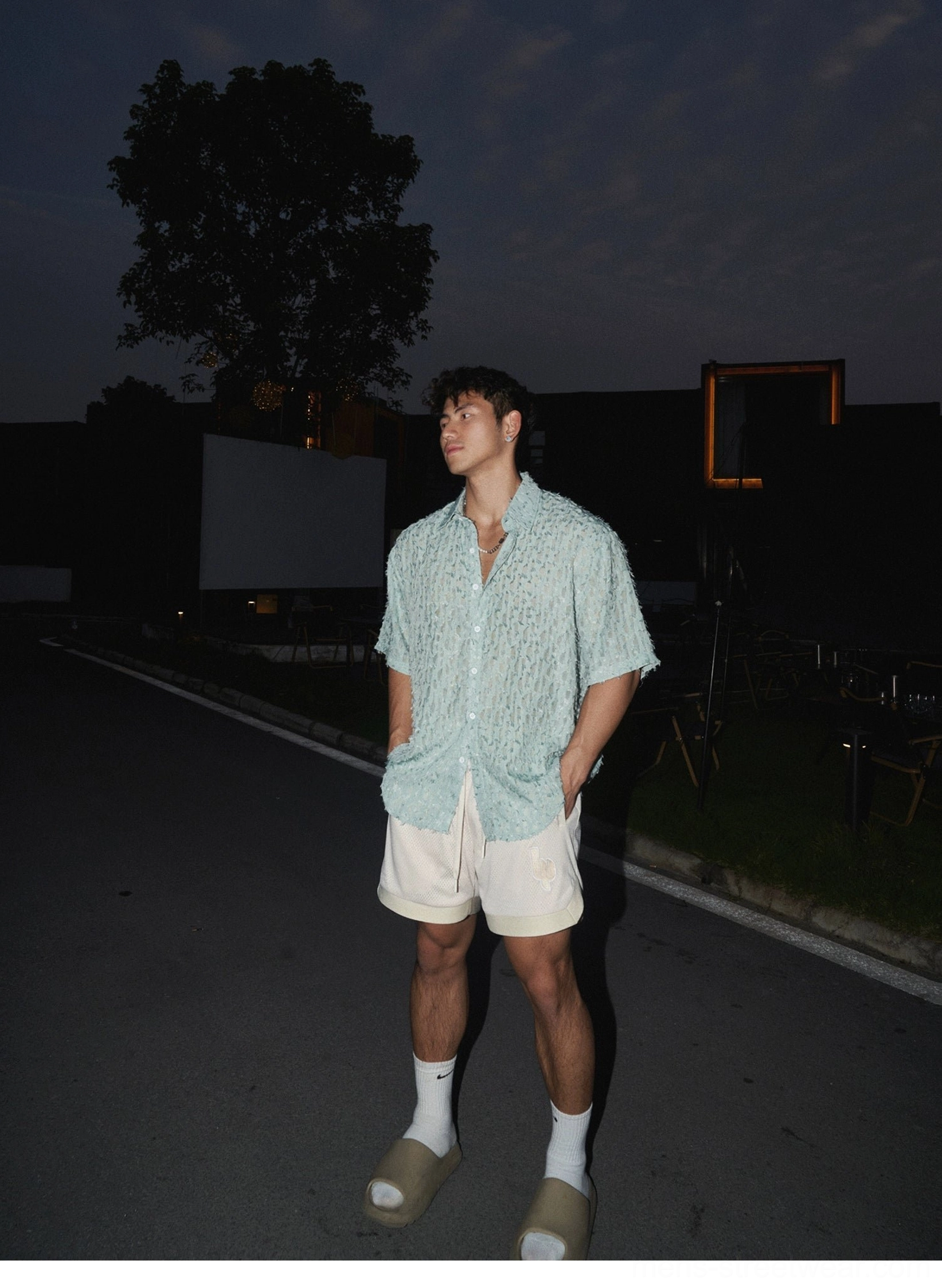 Mesh embroidered athletic shorts product view featuring a relaxed fit, breathable fabric, elastic drawstring waist, and Korean streetwear design