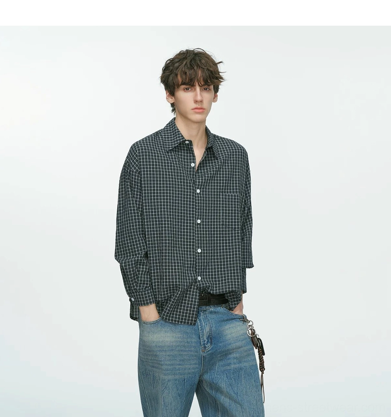 Contemporary East Asian fashion plaid shirt with relaxed proportions, breathable cotton blend construction, and understated styling