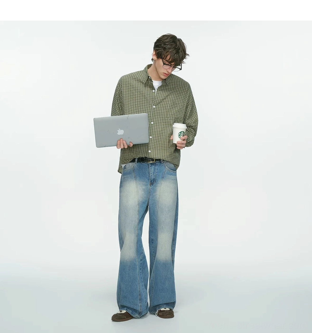 Olive green and white grid plaid streetwear shirt with rolled cuffs styled for a casual campus outfit with laptop and coffee