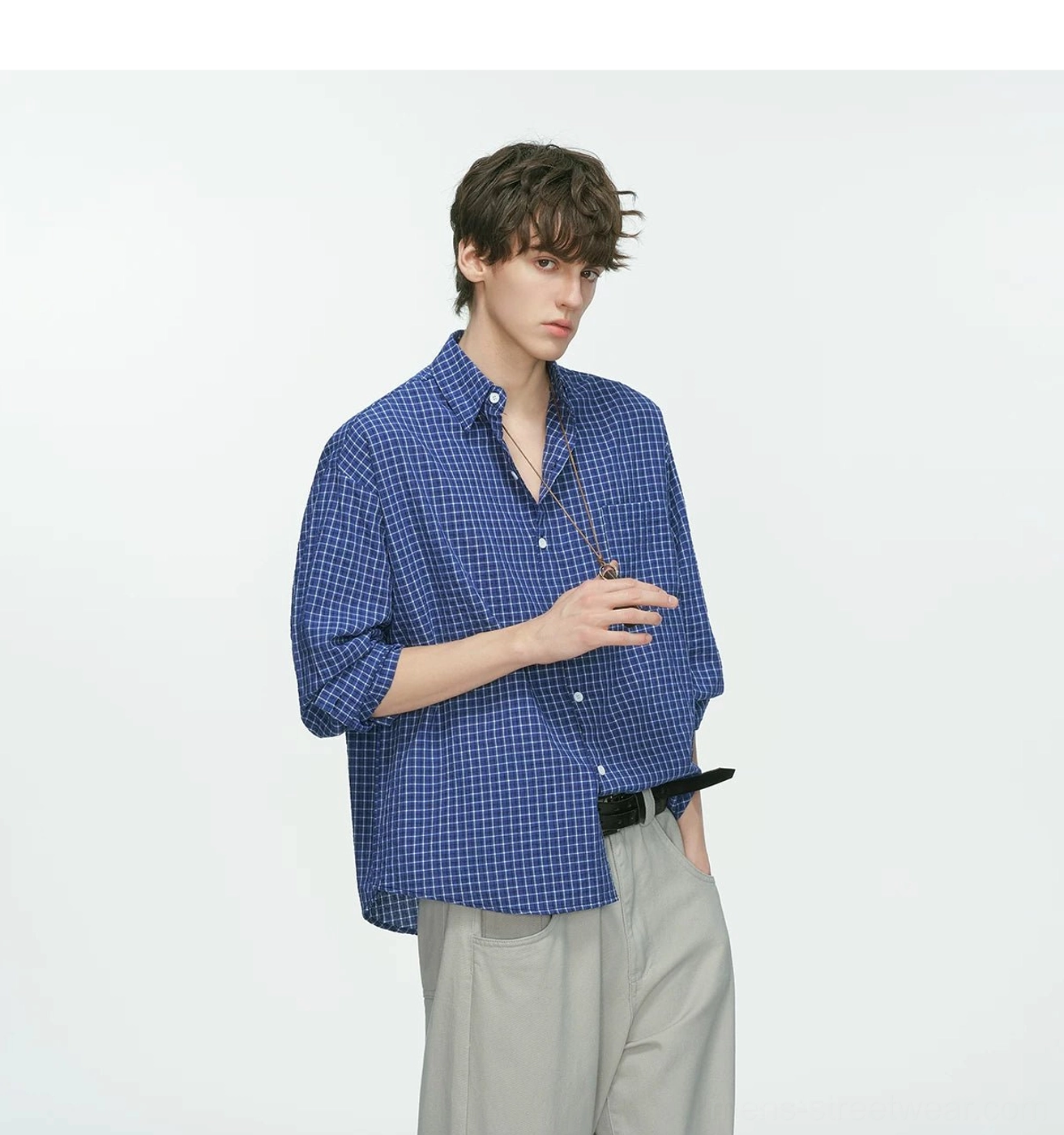 Korean style relaxed plaid shirt with small grid pattern, point collar, chest pocket, and versatile urban casual silhouette