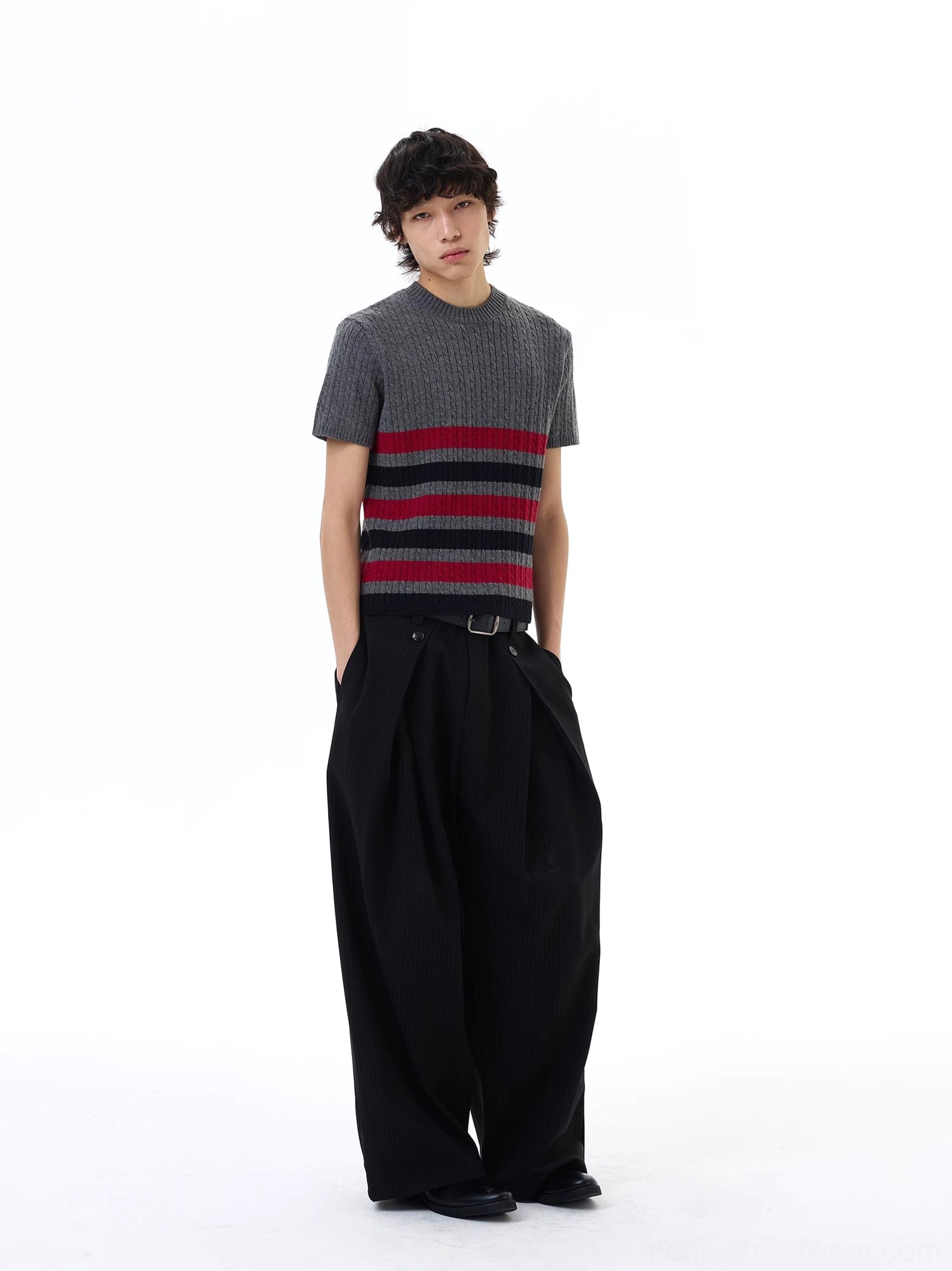 Front view of a cropped grey ribbed knit crew neck tee with graphic red and black stripes in Korean streetwear style