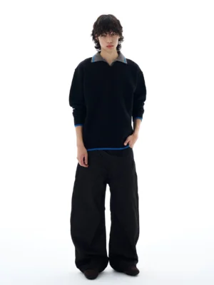 Men's black contrast collar knit sweater with grey polo collar and blue cuff hem trim front view