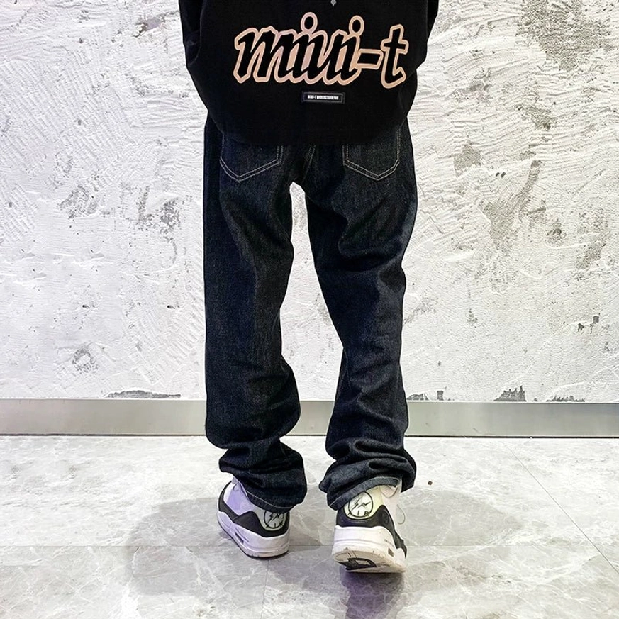 Midnight fade relaxed straight leg jeans dark indigo denim fabric and construction detail