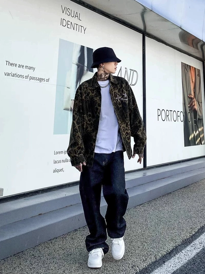 Relaxed straight leg midnight fade jeans in deep indigo worn with a leopard jacket in an urban streetwear look