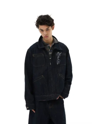 Midnight indigo zip-up denim workwear jacket shown from the front with matching wide-leg denim pants
