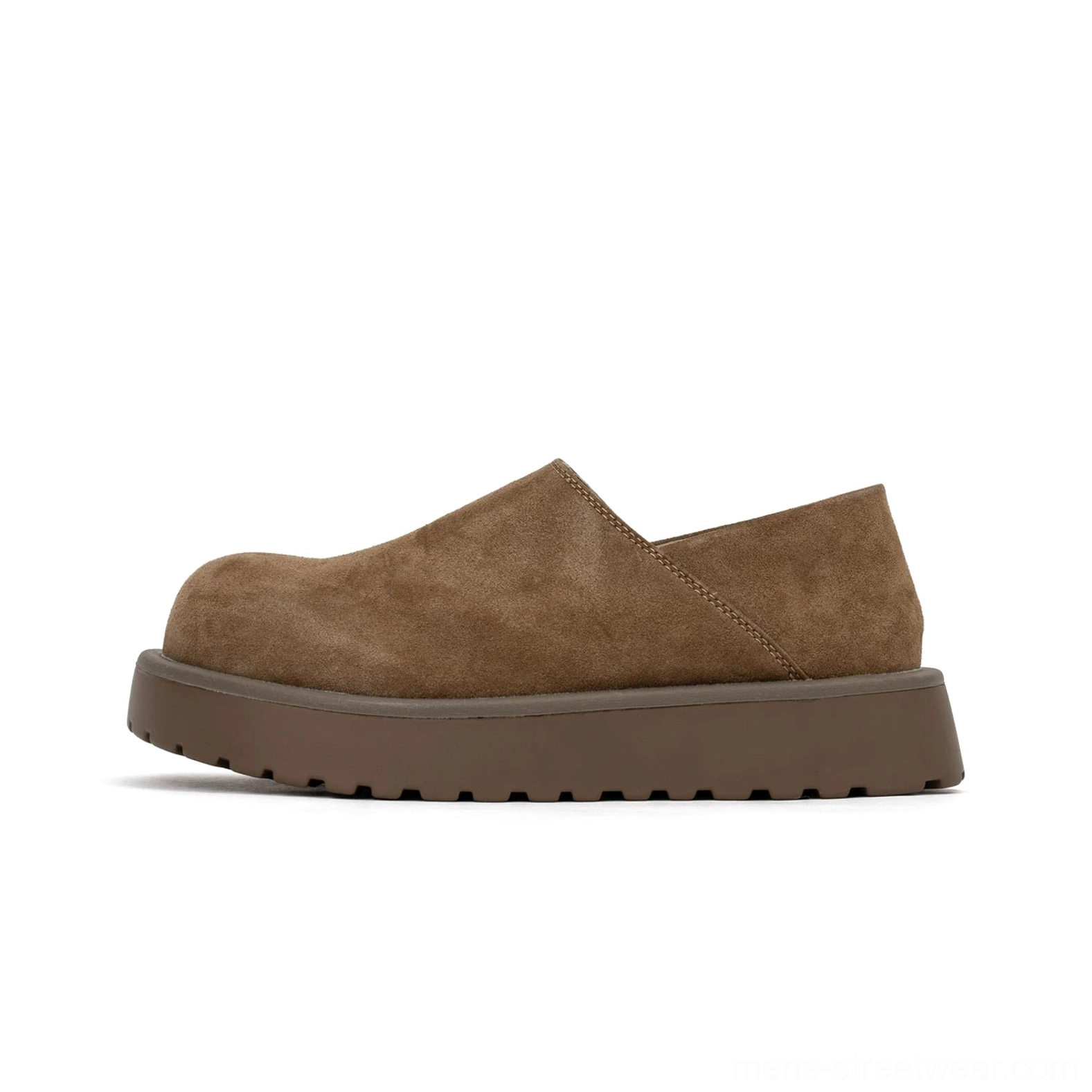 Studio front side view of brown suede-style Midnight Monolith platform slip-on clogs with rounded toe and chunky rubber outsole