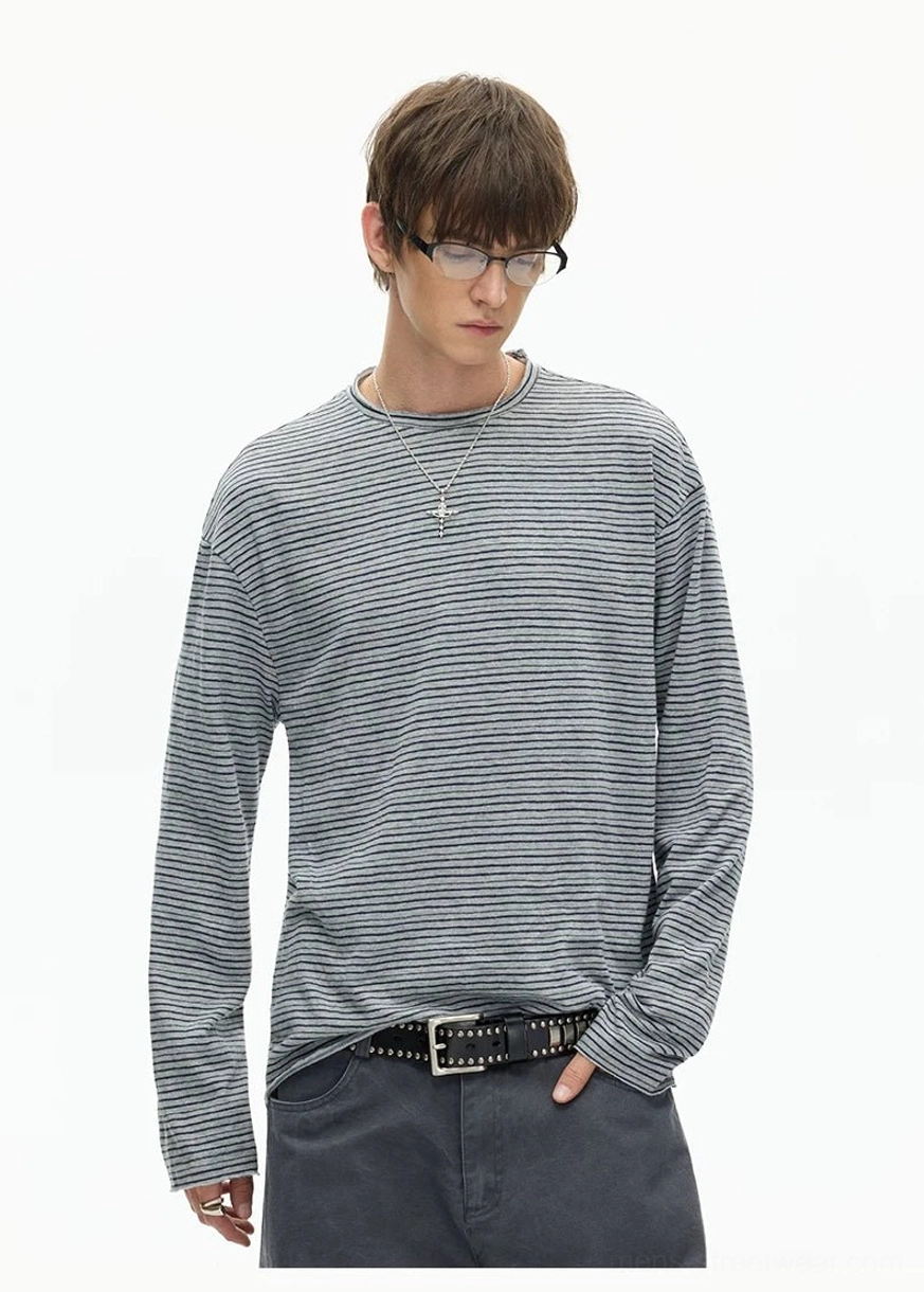 Minimal long sleeve crew neck tee with relaxed proportions for Japanese inspired casual streetwear outfits