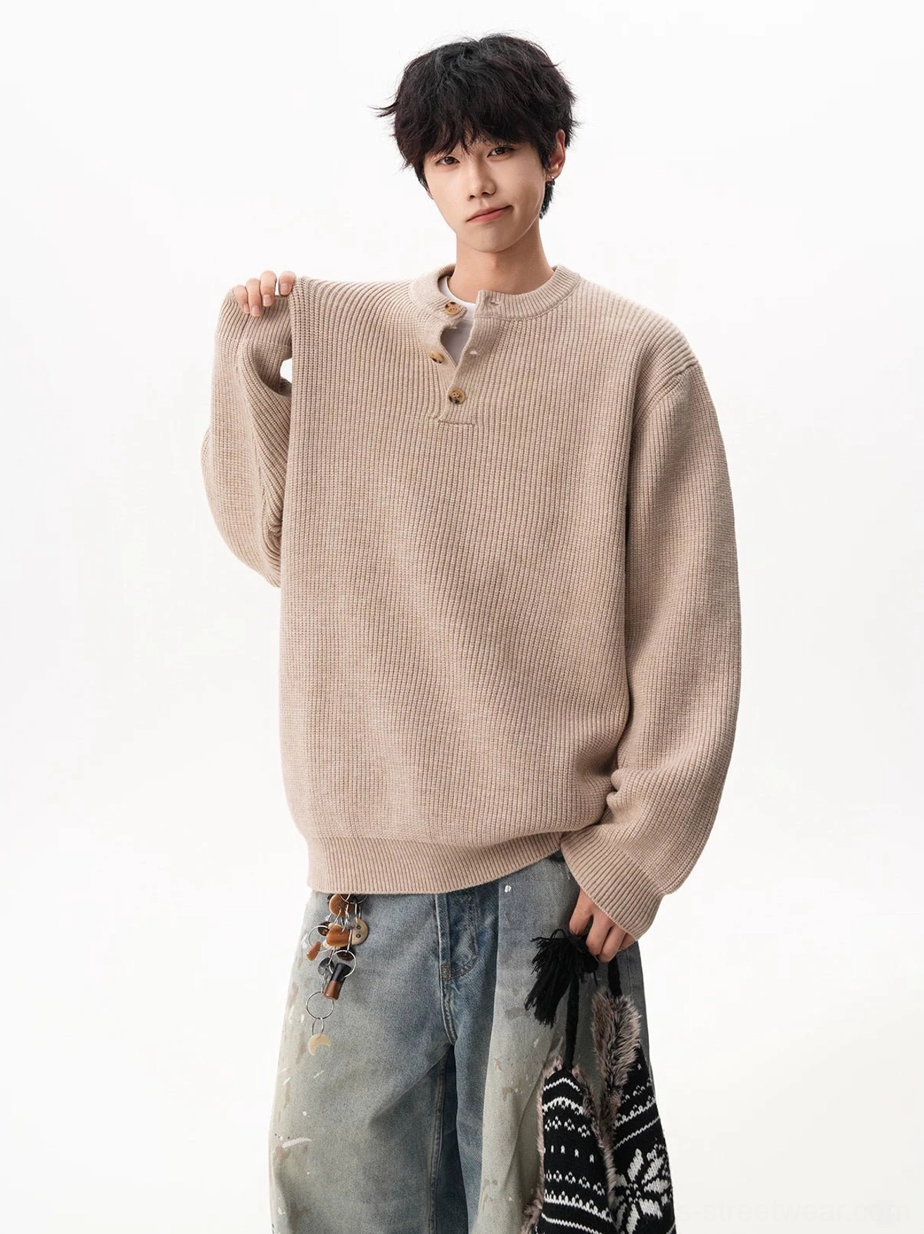 Minimal oversized waffle knit sweater with drop shoulders and ribbed cuffs for modern East Asian streetwear styling