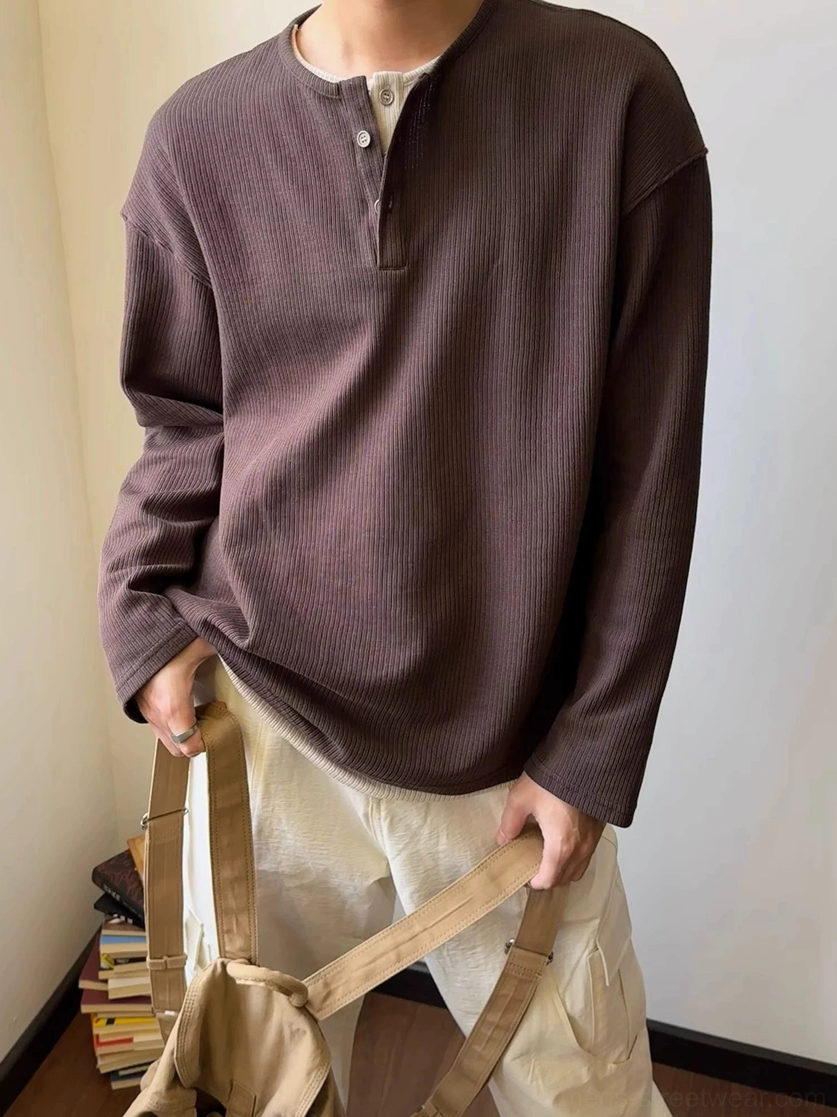 Minimal waffle knit Henley long-sleeve top with neutral color styling and loose contemporary fit
