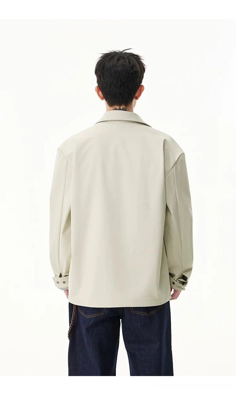 Back view of men's pale beige zip shirt jacket showing clean relaxed streetwear silhouette and seam detail