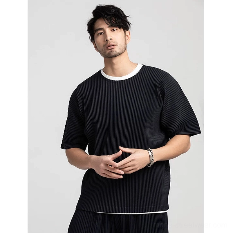 Minimalist men's pleated crew neck tee suitable for layered outfits, travel, and contemporary streetwear