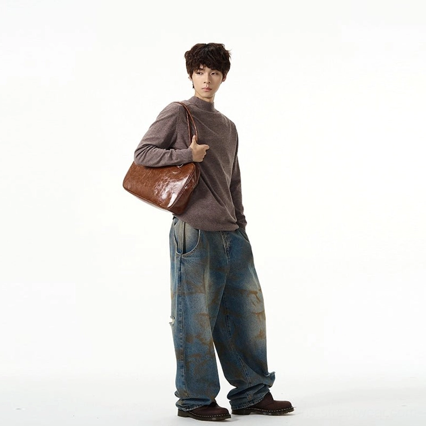 Brown minimalist mock neck knit sweater for men with relaxed Seoul streetwear fit and soft fine knit finish