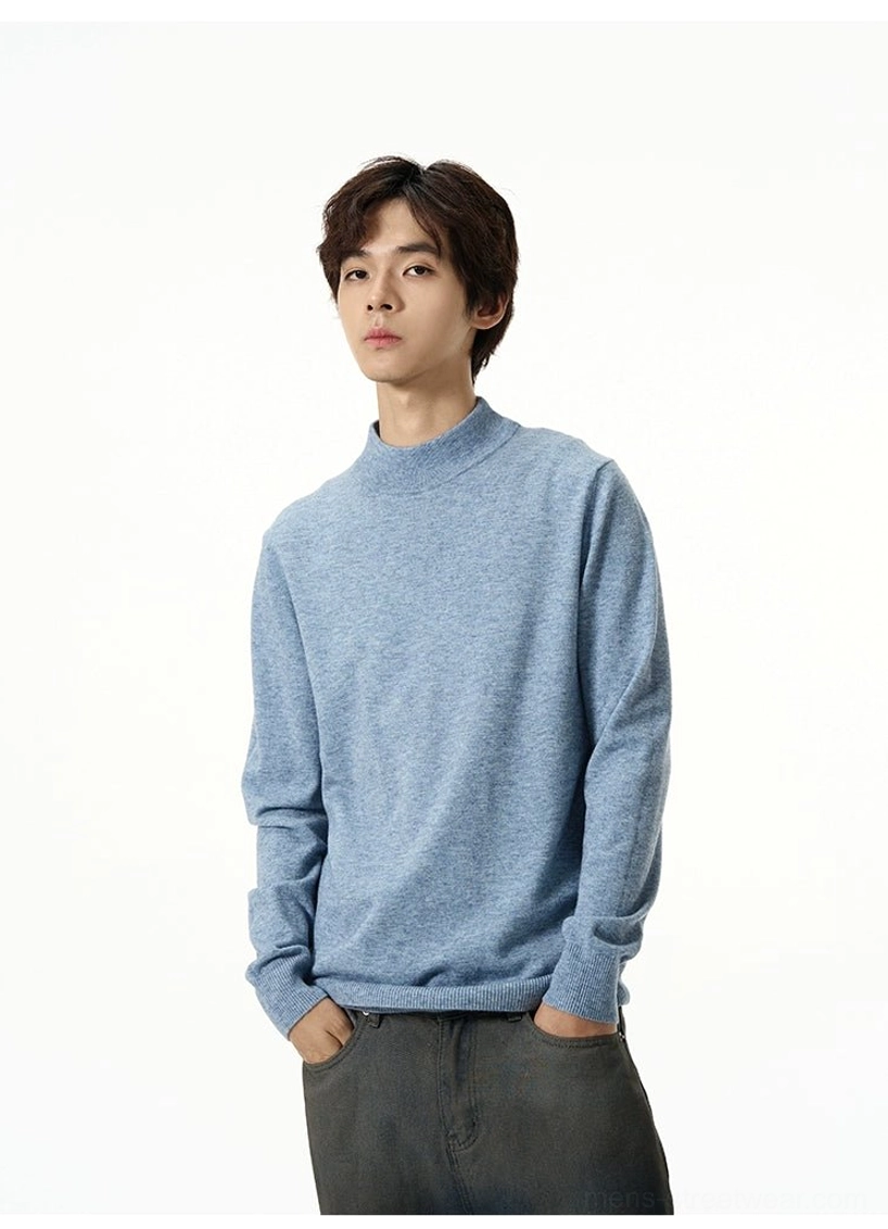 Heather light blue soft knit mock neck sweater for men shown in front half body Seoul fashion styling