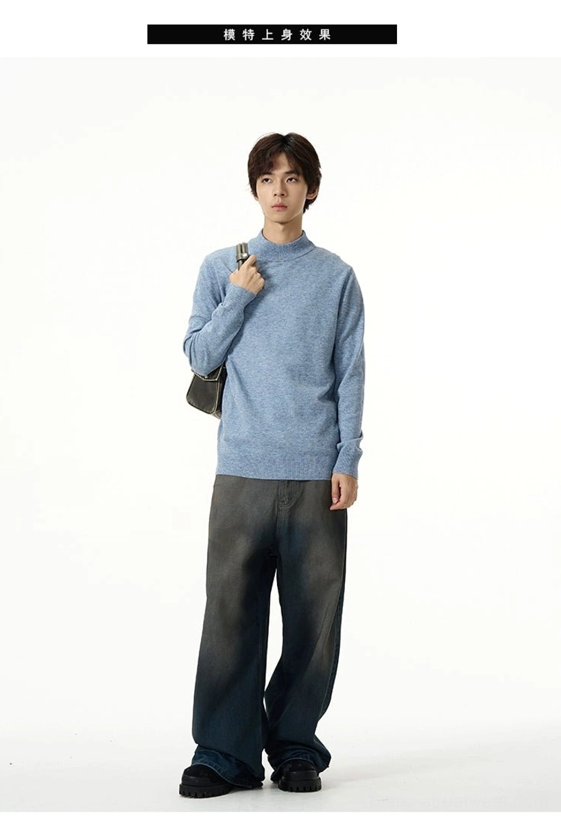 Heather light blue minimalist mock neck knit sweater styled with vintage washed wide leg denim and crossbody bag