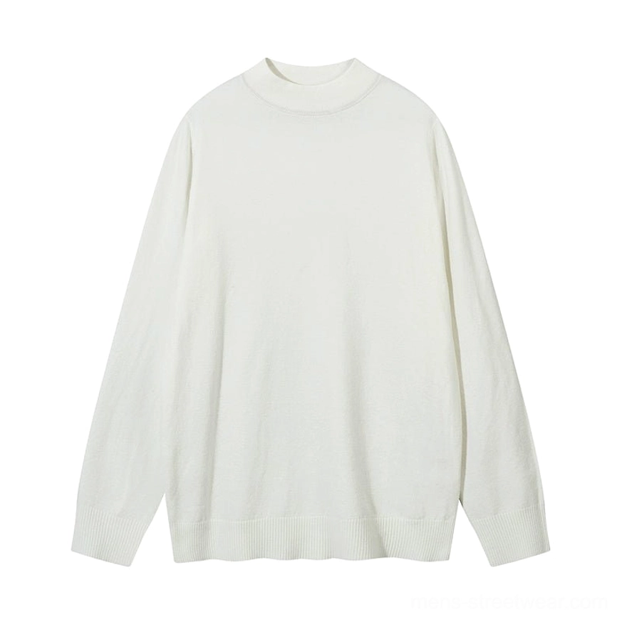 Off white minimalist mock neck knit sweater flat lay with soft fine knit texture and relaxed silhouette