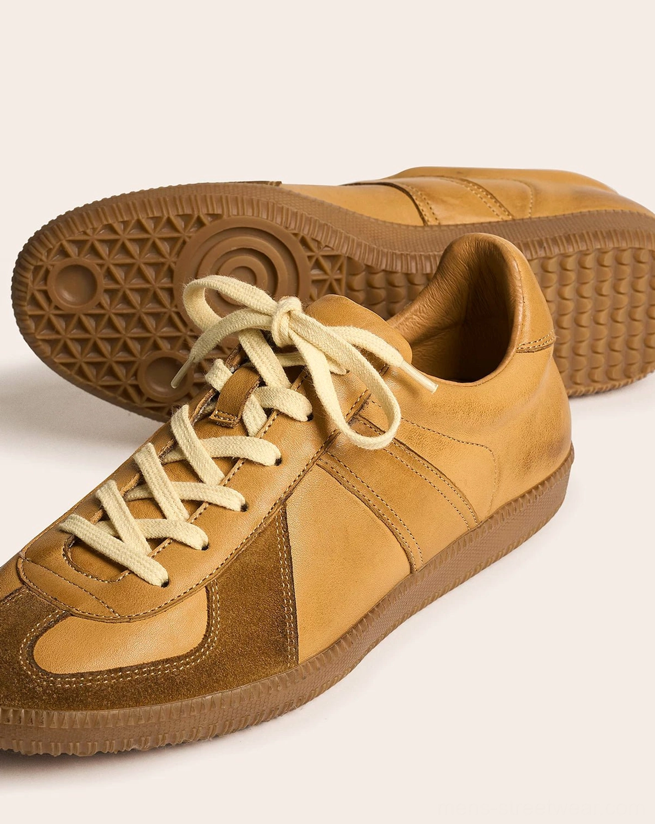 Minimalist vintage leather streetwear sneakers with washed cowhide upper and durable gum rubber sole