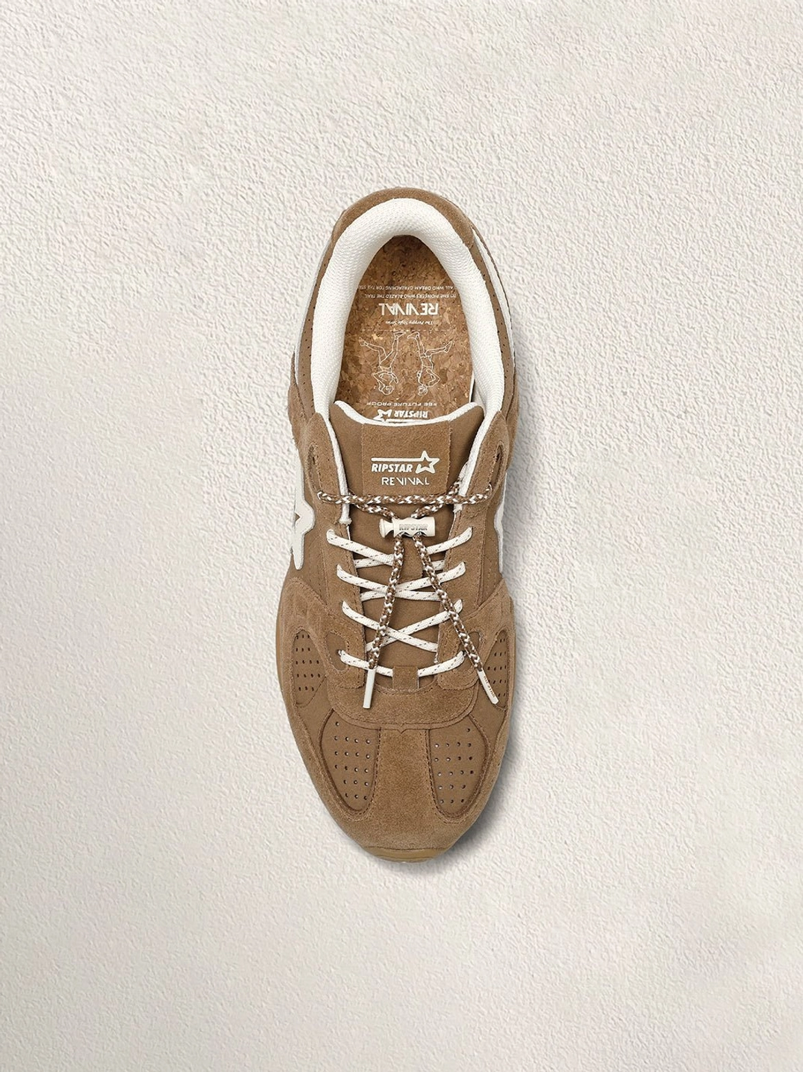Single mocha suede retro sneaker shown from above with perforated toe box and cream five-point star panel