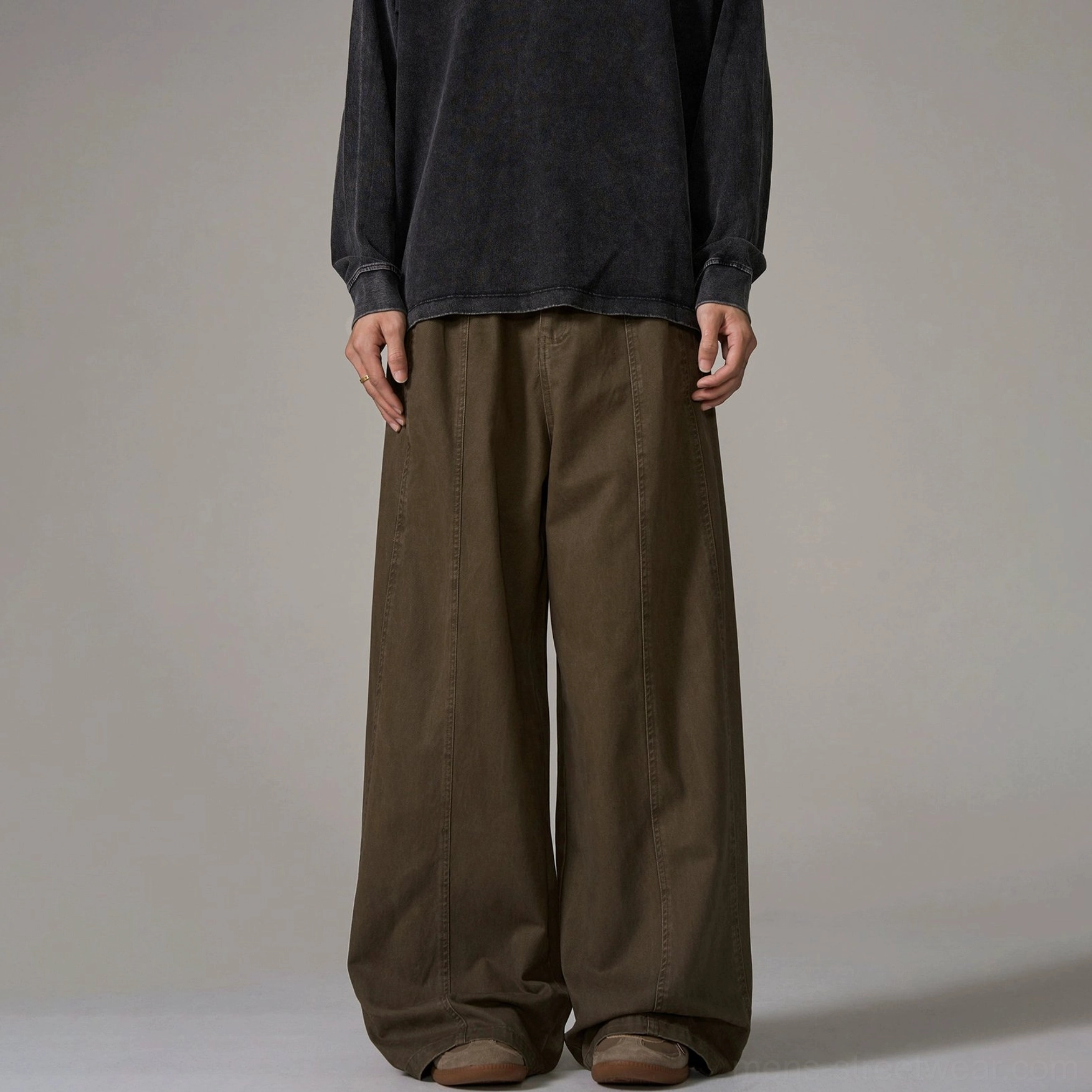 Modern Acubi fashion trousers with relaxed proportions, breathable cotton construction, and minimalist finish