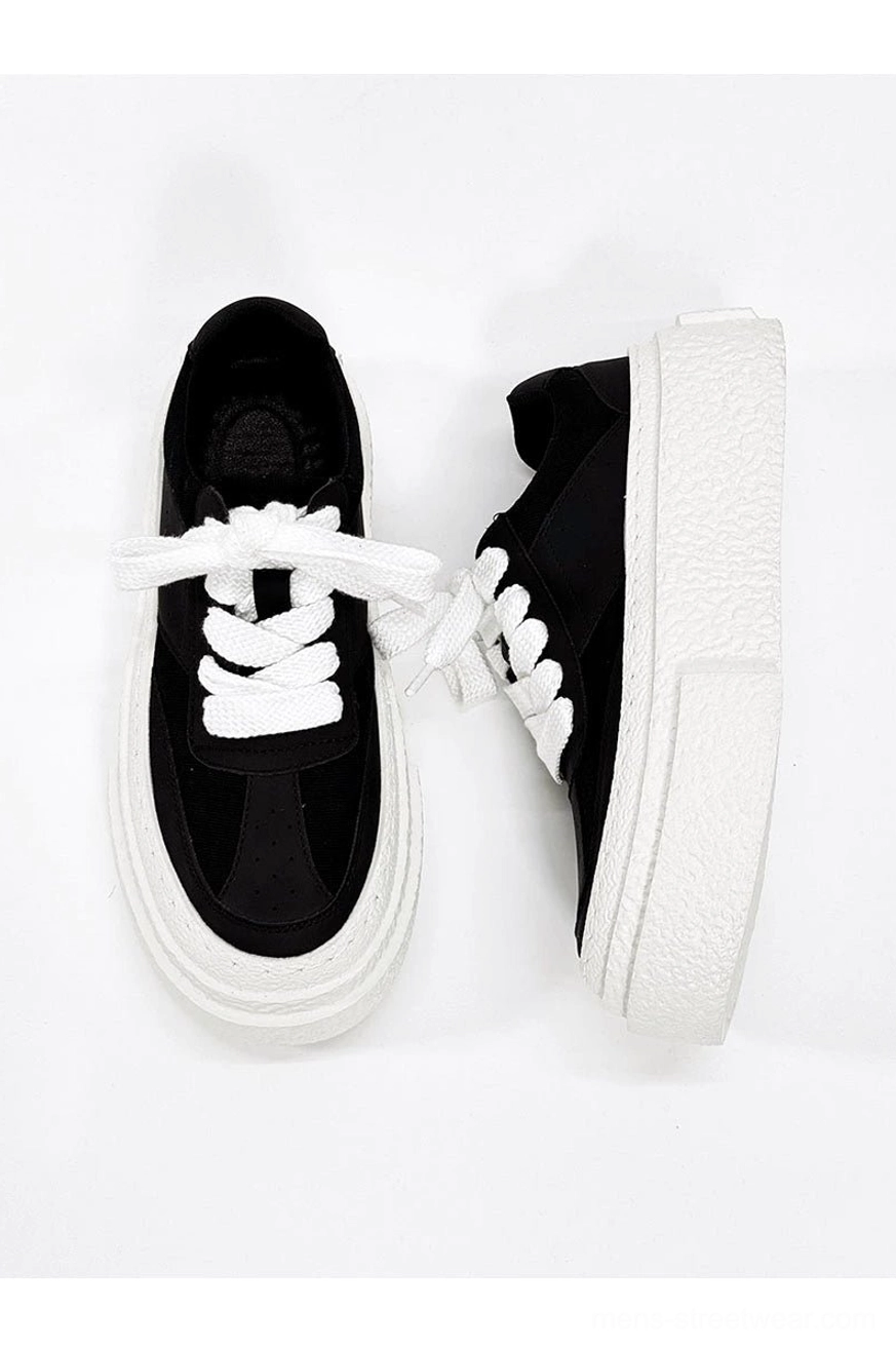 Modern chunky platform sneakers with thick textured rubber soles for Korean streetwear outfits