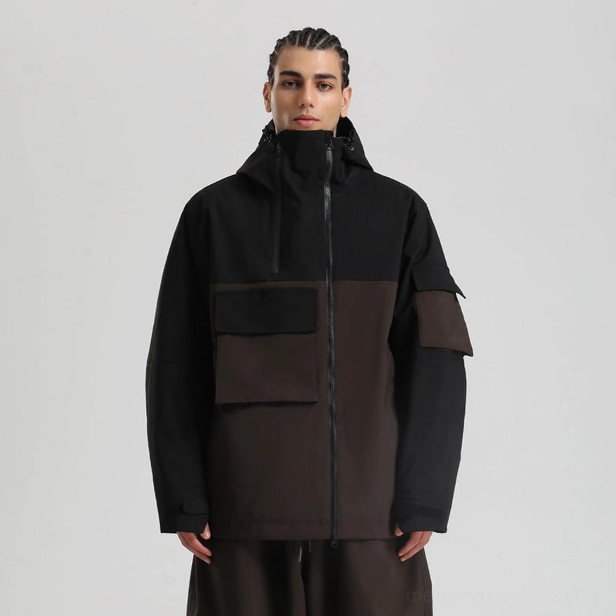 Modern colorblock ski jacket designed for winter layering with hood, weather-ready shell, insulated construction, and utility pocket layout