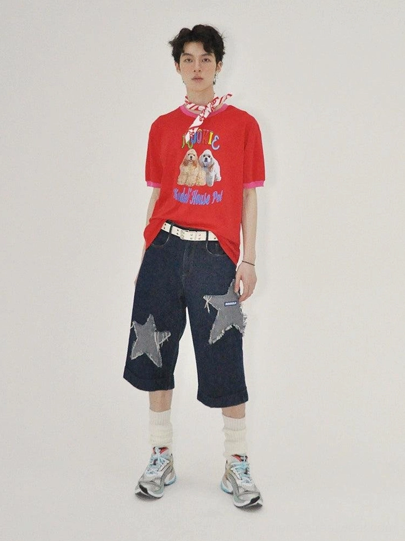 Modern dark indigo star patch denim culottes designed with a relaxed cropped silhouette for casual urban and streetwear styling