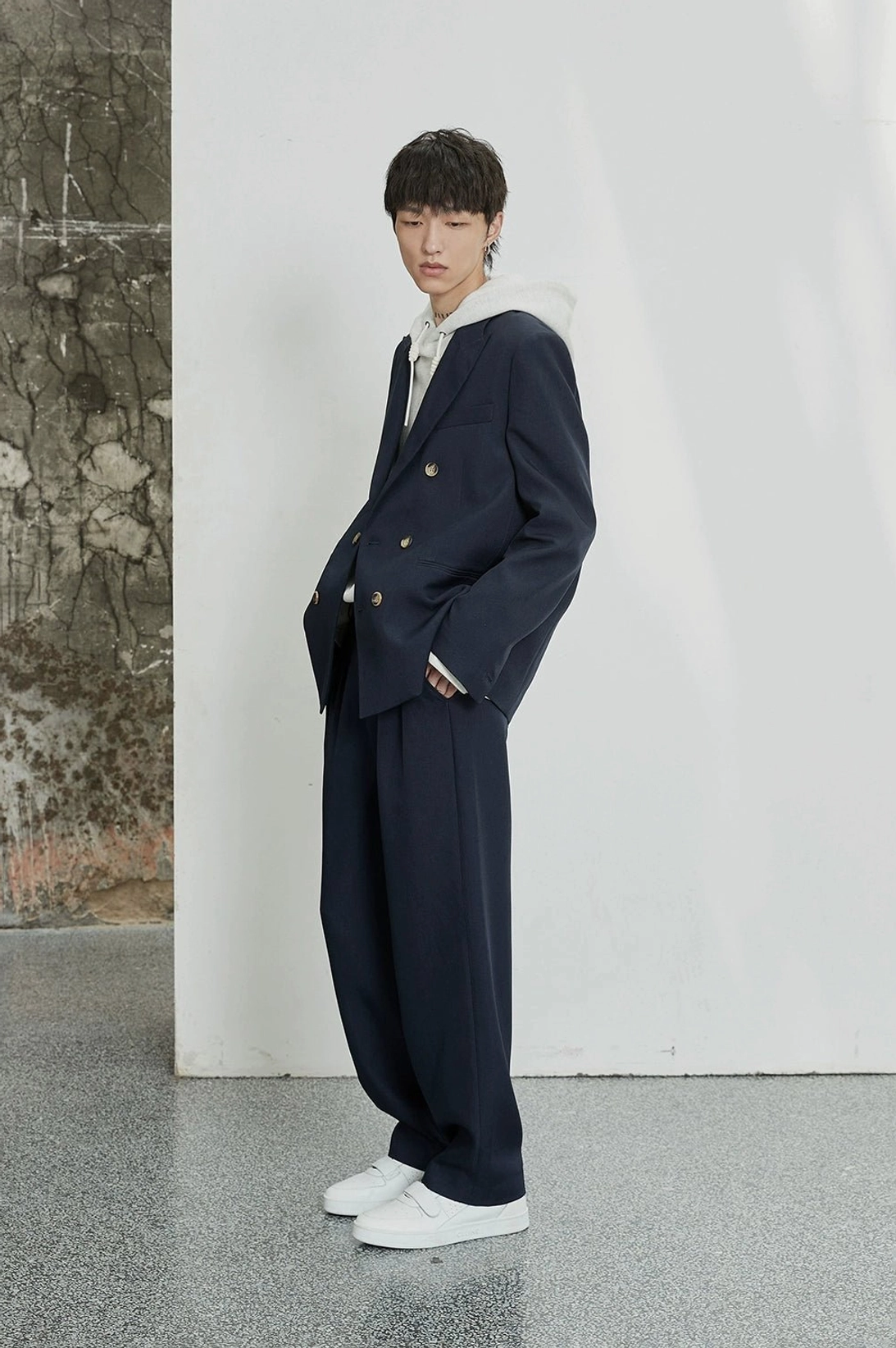Modern double-pleated trousers with dimensional fit for Seoul-inspired everyday styling