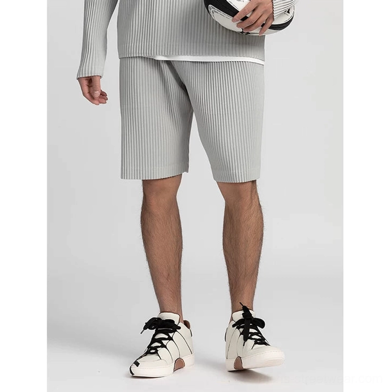 Modern men's pleated streetwear tee with relaxed sleeves and textured fabric for casual everyday styling