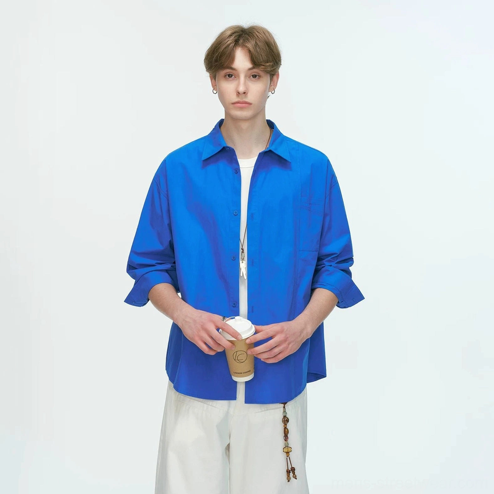 Modern oversized poplin shirt designed for comfortable daily wear layered outfits and Seoul fashion styling