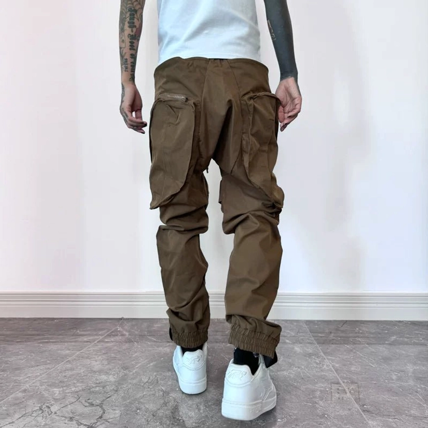 Modern utility cargo joggers showcasing polyester fabric, layered pocket design and Korean streetwear styling