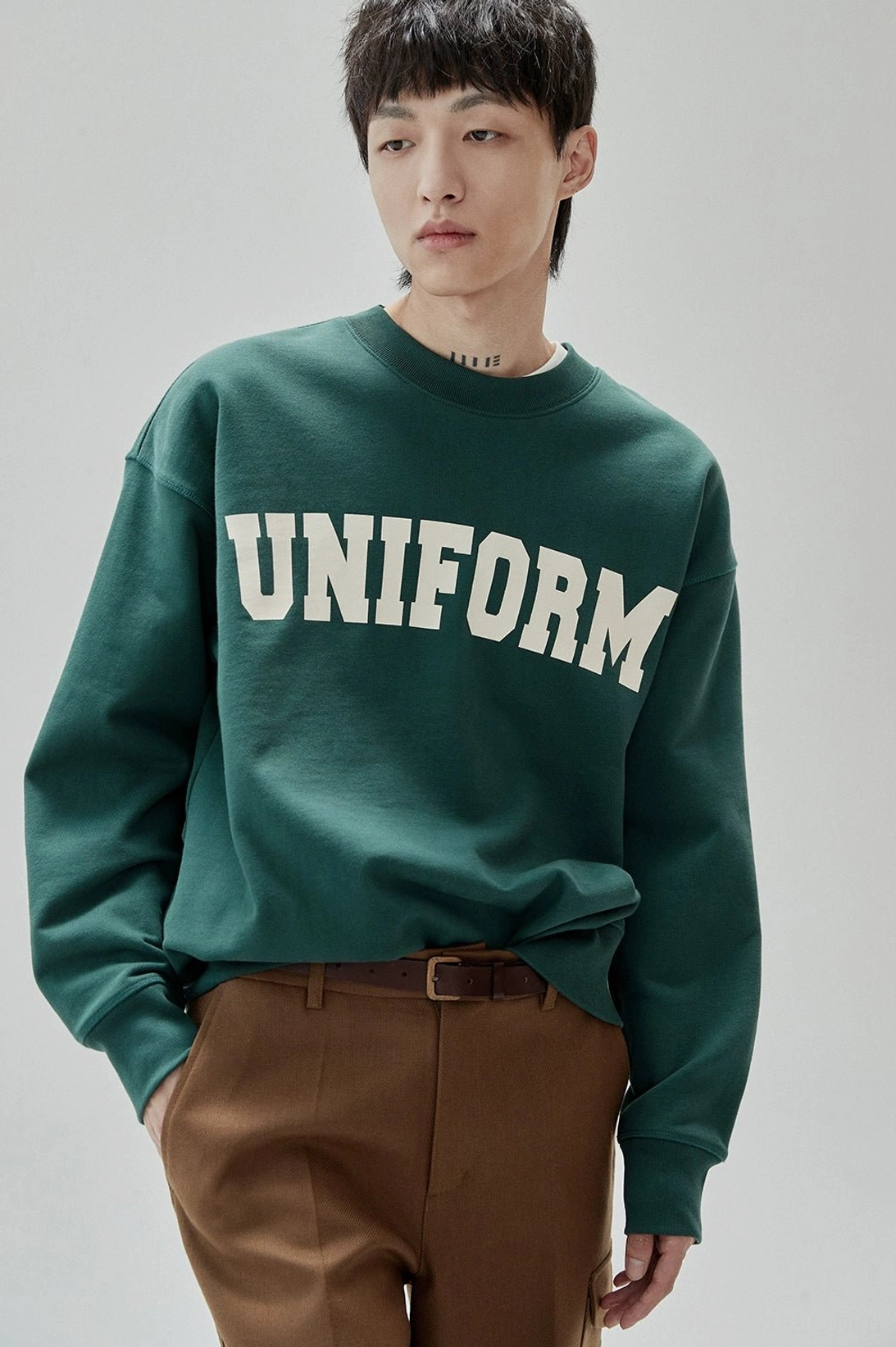 Modern varsity-inspired graphic crewneck sweatshirt for men's casual streetwear wardrobes