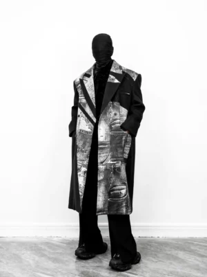 Monochrome denim illusion double-breasted long overcoat front view worn in a minimalist studio