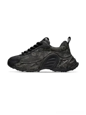 Dark monogram drift chunky sneakers in left side profile with black toe cap and sculpted black rubber sole