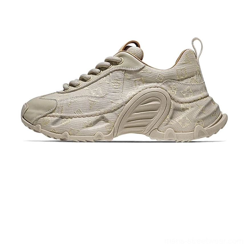 Dark monogram patterned chunky sneakers with black rubber toe cap oversized outsole and contrasting side trim