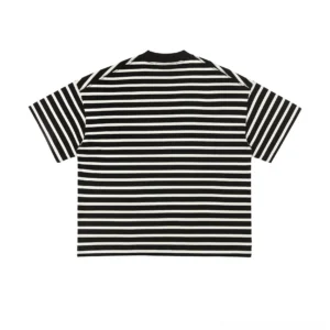 Back view of a relaxed striped streetwear T-shirt showing continuous horizontal black and almond stripes, dropped shoulders, and loose boxy silhouette
