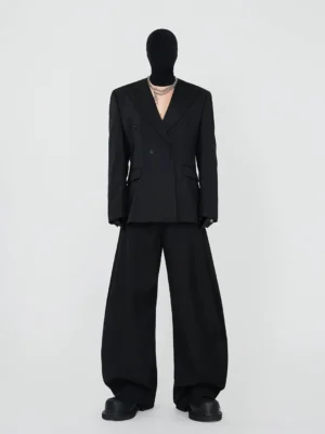 Black double-breasted blazer and wide-leg trousers in an avant-garde Korean streetwear tailored outfit front view