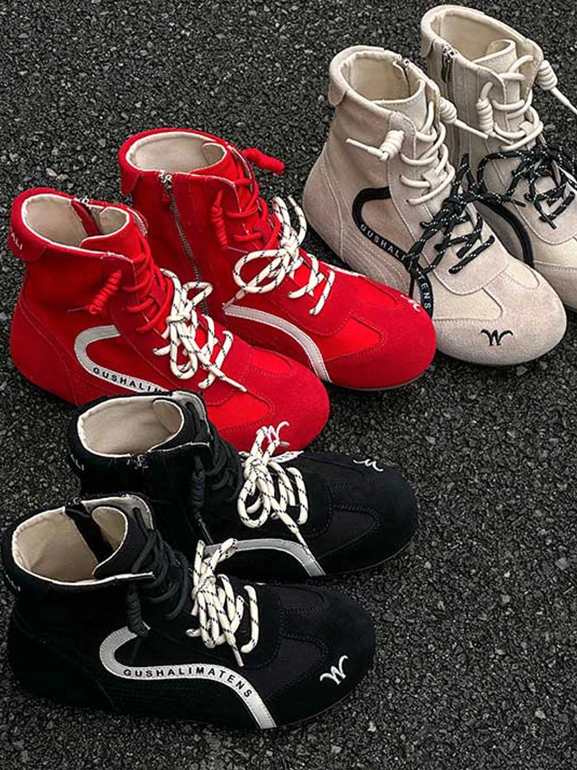 Multiple colorways of high-top suede racing training boots in red, beige, and black with double-lace and side-zip construction